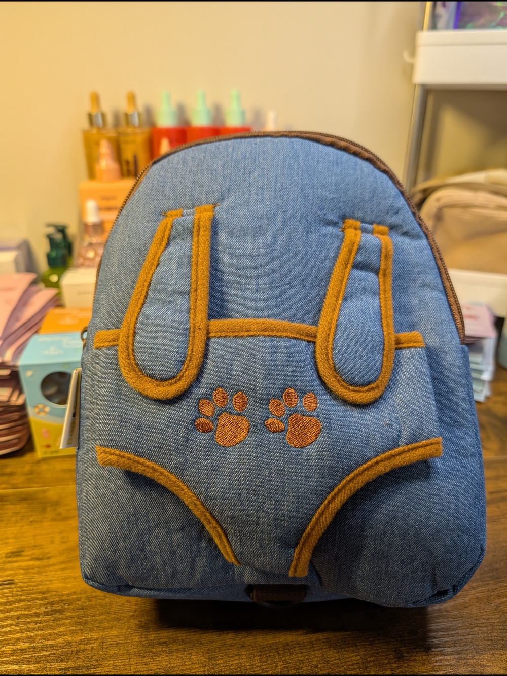Denim Blue Backpack with Tan Trim and Paw Embroidery